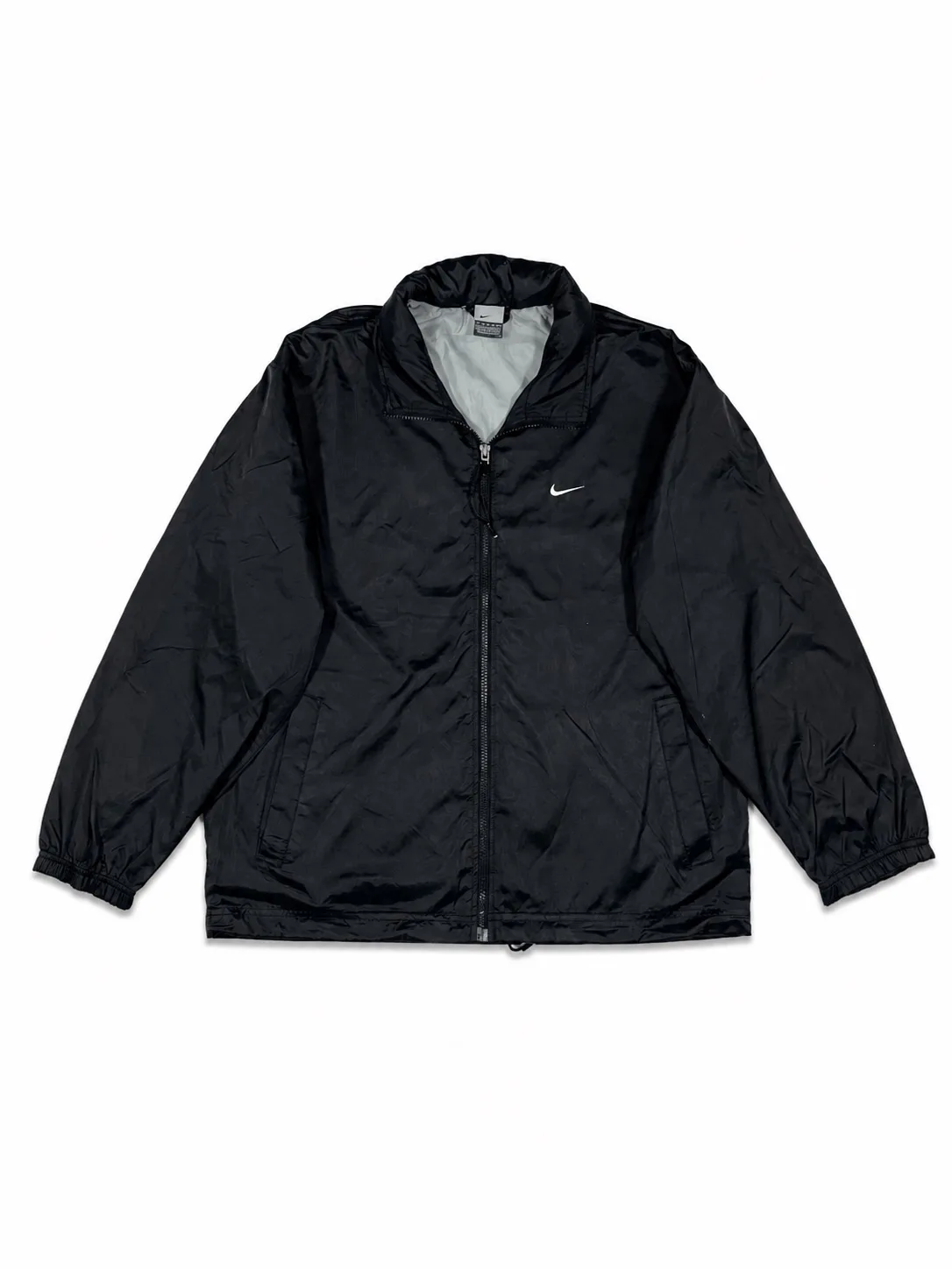 Nike’s Shell Jacket With Hidden Collar Cap